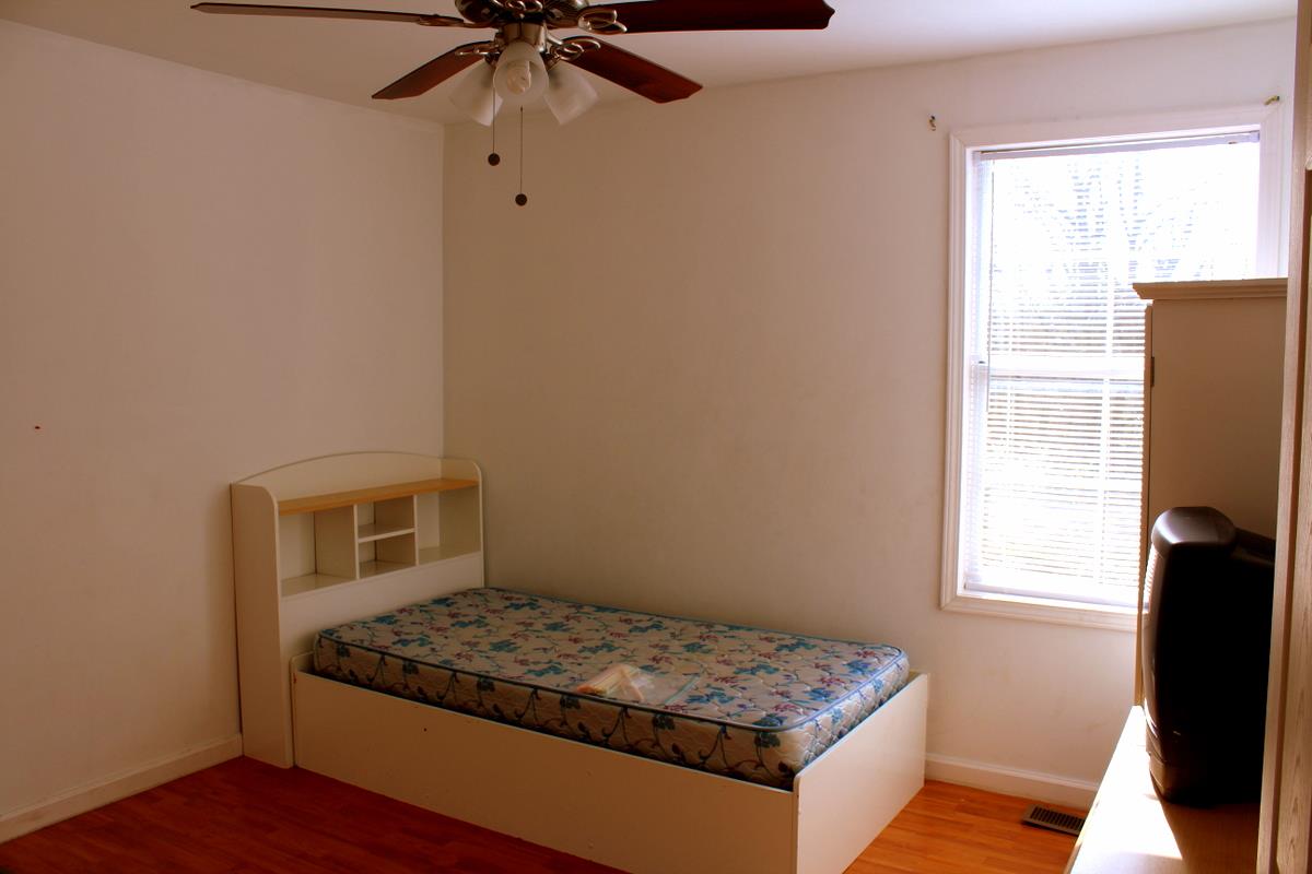 313 Randy Road Madison, TN 37115 - Photo 13 of 22 a bedroom with a bed and a window