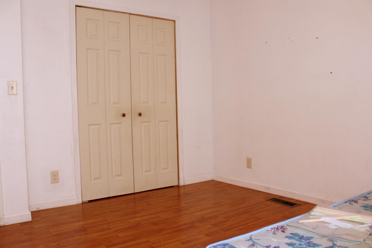 313 Randy Road Madison, TN 37115 - Photo 14 of 22 a view of an empty room with wooden floor