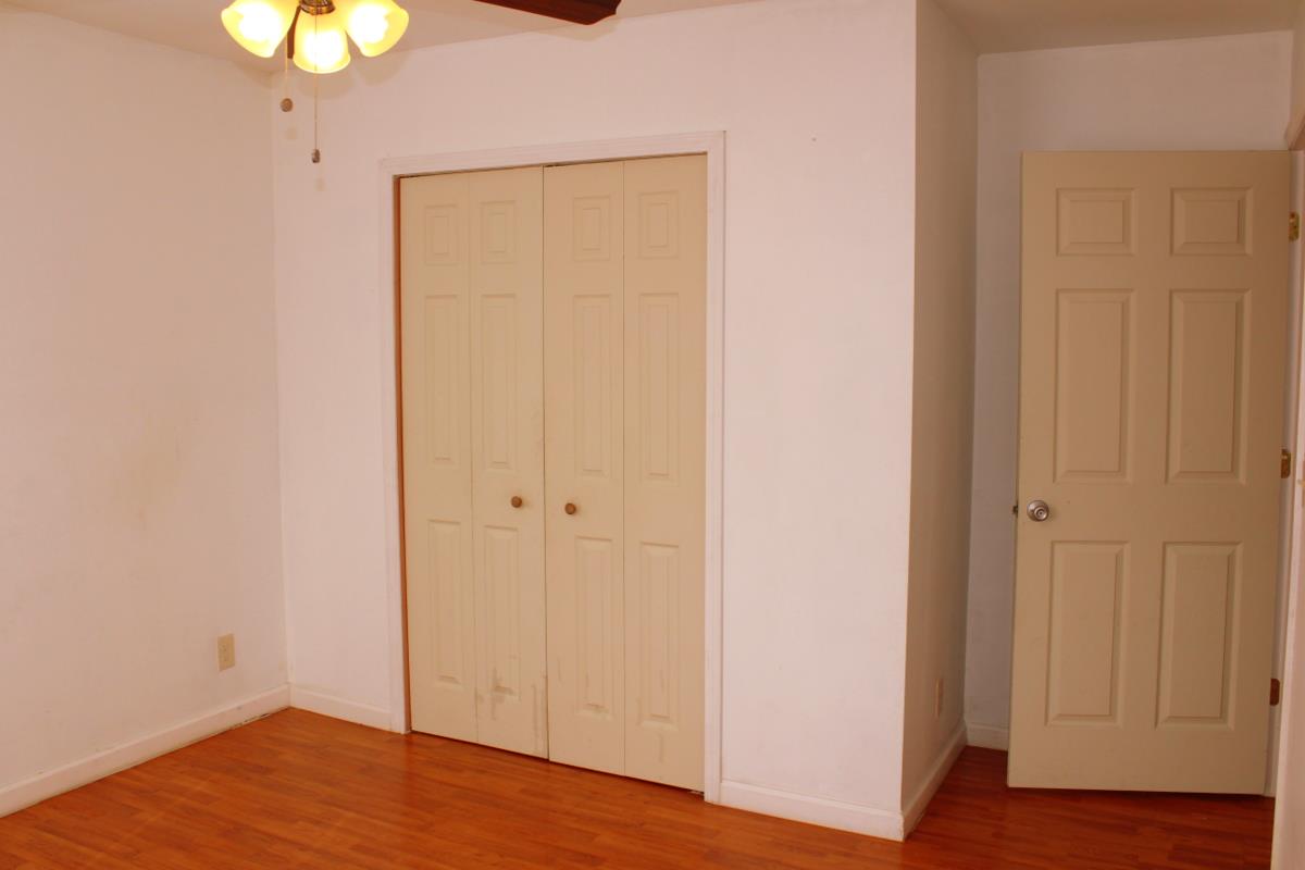 313 Randy Road Madison, TN 37115 - Photo 17 of 22 a view of an empty room with wooden floor