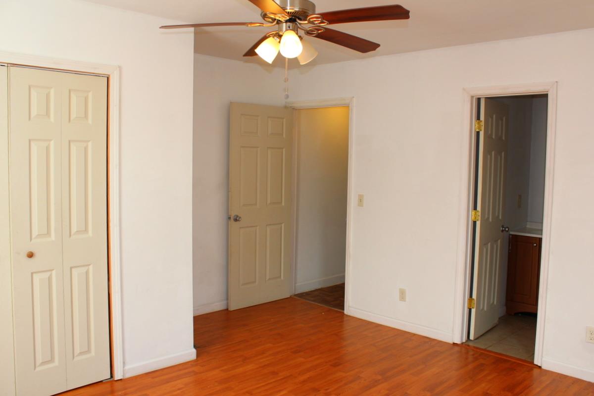313 Randy Road Madison, TN 37115 - Photo 19 of 22 a view of an empty room with wooden floor