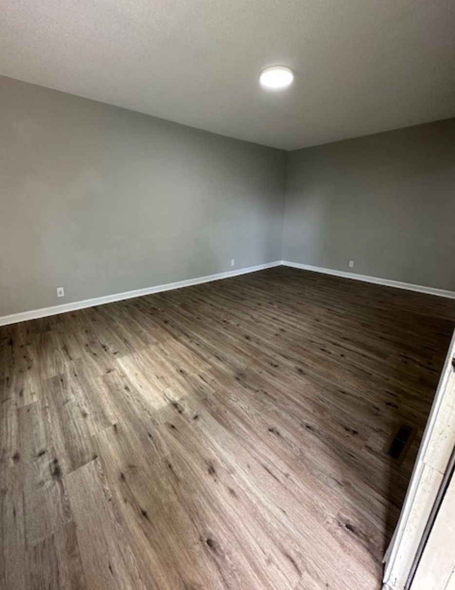 1533 Old Lascassas Road Murfreesboro, TN 37130 - Photo 13 of 13 a view of an empty room and wooden floor