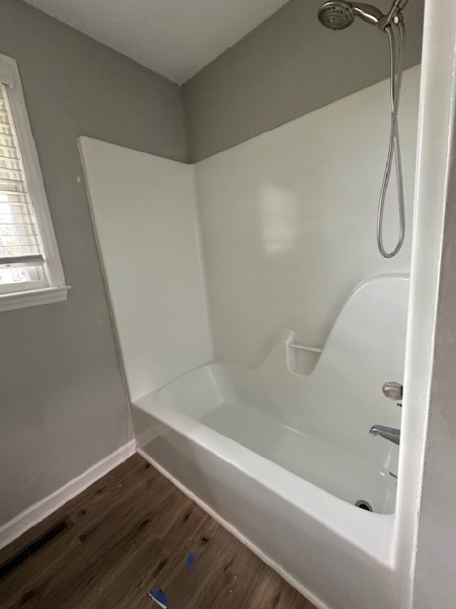 1533 Old Lascassas Road Murfreesboro, TN 37130 - Photo 4 of 13 a bathroom with a bathtub