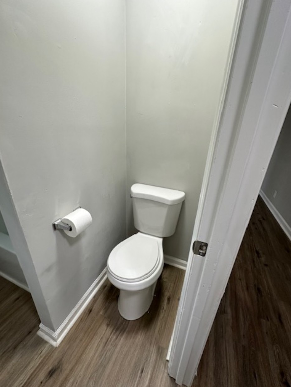 1533 Old Lascassas Road Murfreesboro, TN 37130 - Photo 5 of 13 a white toilet sitting next to a small sink
