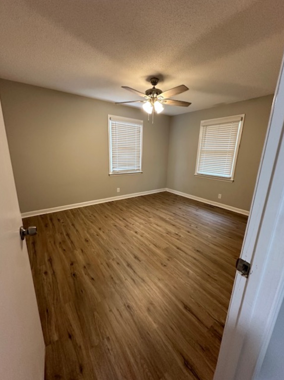1533 Old Lascassas Road Murfreesboro, TN 37130 - Photo 10 of 13 wooden floor in an empty room with a window