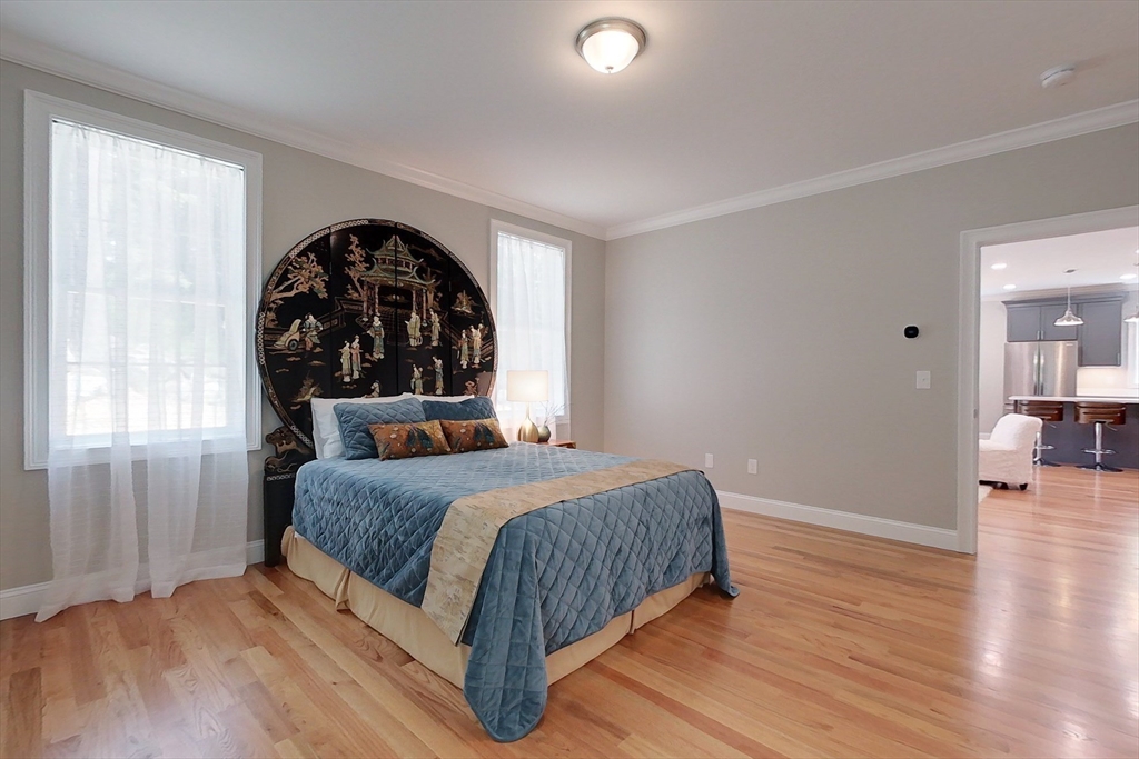 531 Clark Street Gardner, MA 01440 - Photo 17 of 42 a bedroom with a large bed and a large window