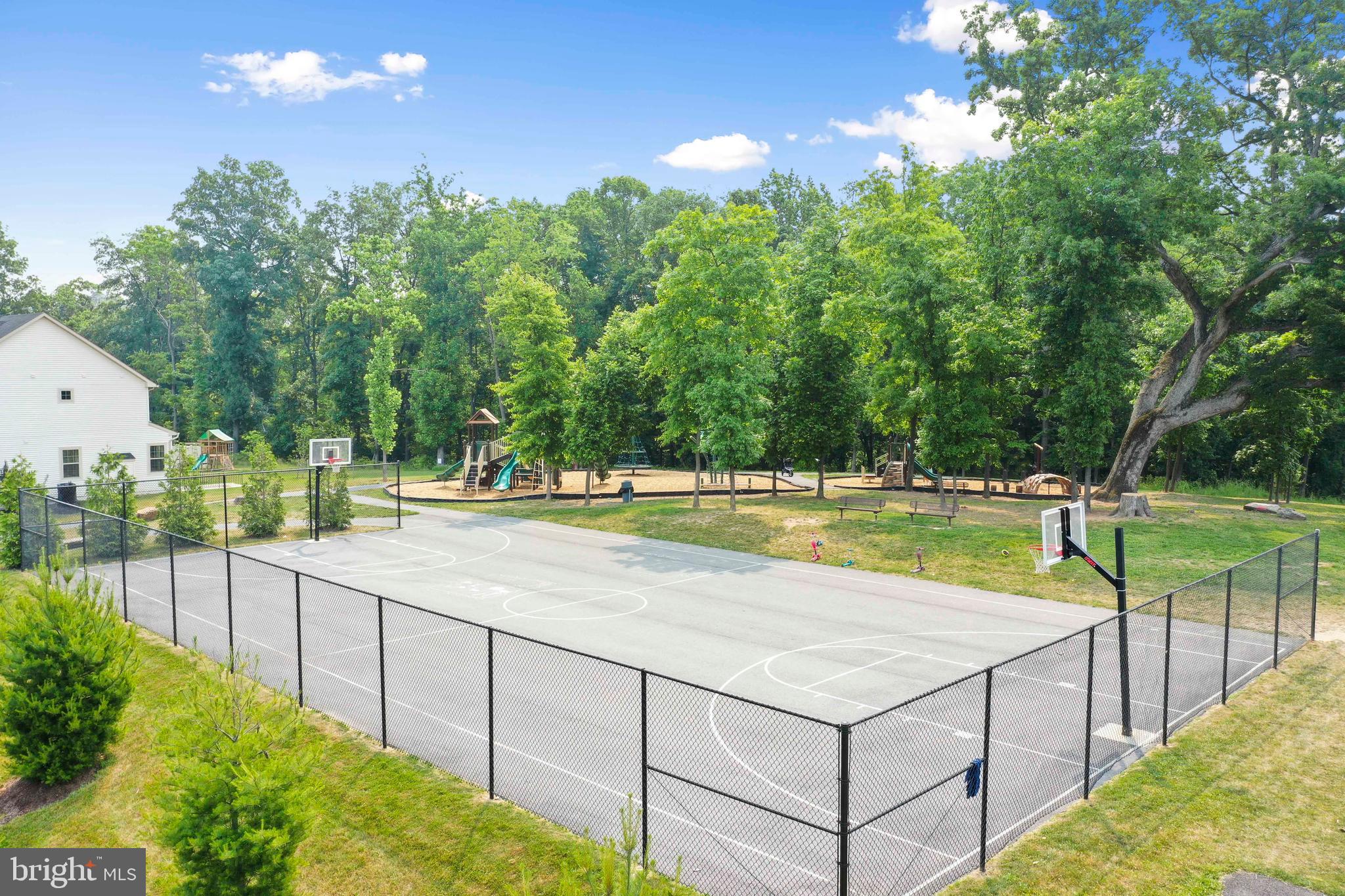 6705 West Lakeridge Road New Market, MD 21774 - Photo 31 of 39 a view of an outdoor space and a swimming pool