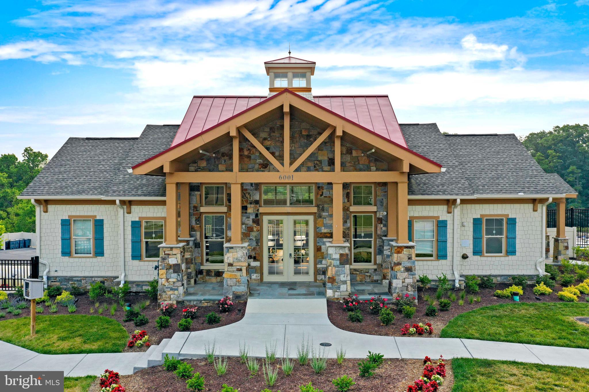 6705 West Lakeridge Road New Market, MD 21774 - Photo 33 of 39 front view of a house with a yard