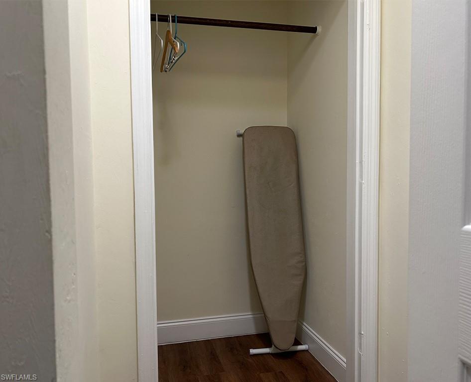 25000 Tamiami Trail East, Unit F179 Naples, FL 34114 - Photo 13 of 13 a view of a mirror with wooden floor