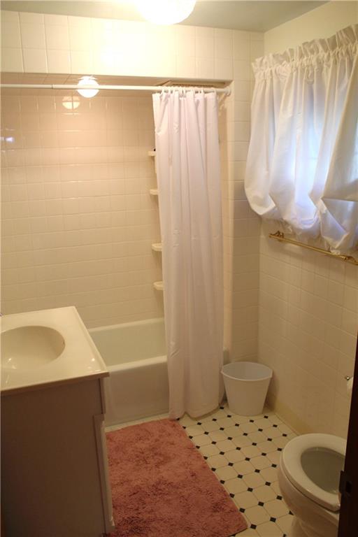 204 Ellsworth Street California, PA 15419 - Photo 12 of 27 a bathroom with a sink and a shower