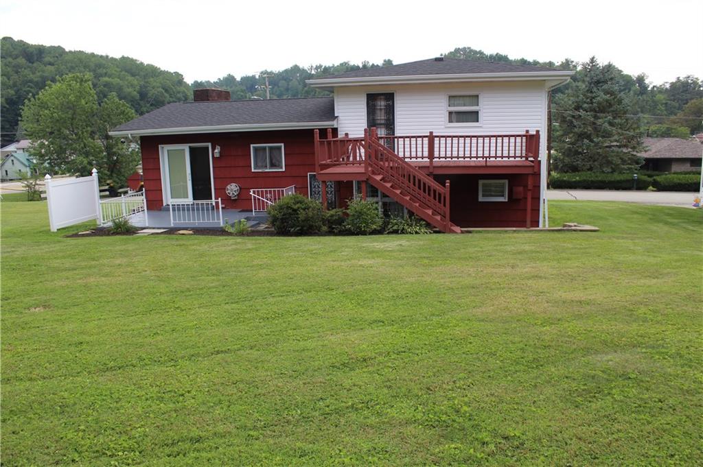 204 Ellsworth Street California, PA 15419 - Photo 25 of 27 a front view of a house with garden