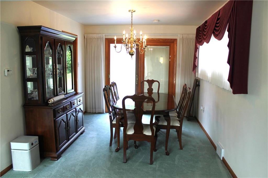 204 Ellsworth Street California, PA 15419 - Photo 4 of 27 a view of a dining room with furniture and chandelier