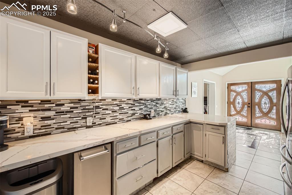 46 Barr Lake Circle Divide, CO 80814 - Photo 13 of 47 a kitchen with a sink and cabinets