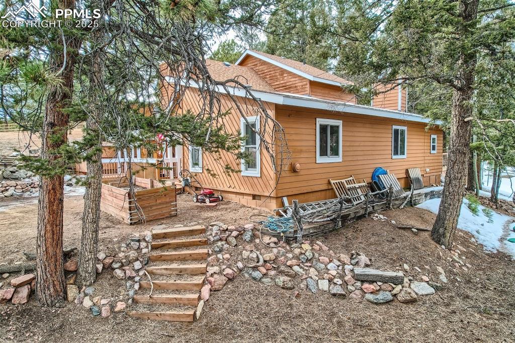 46 Barr Lake Circle Divide, CO 80814 - Photo 29 of 47 a backyard of a house with barbeque oven table and chairs