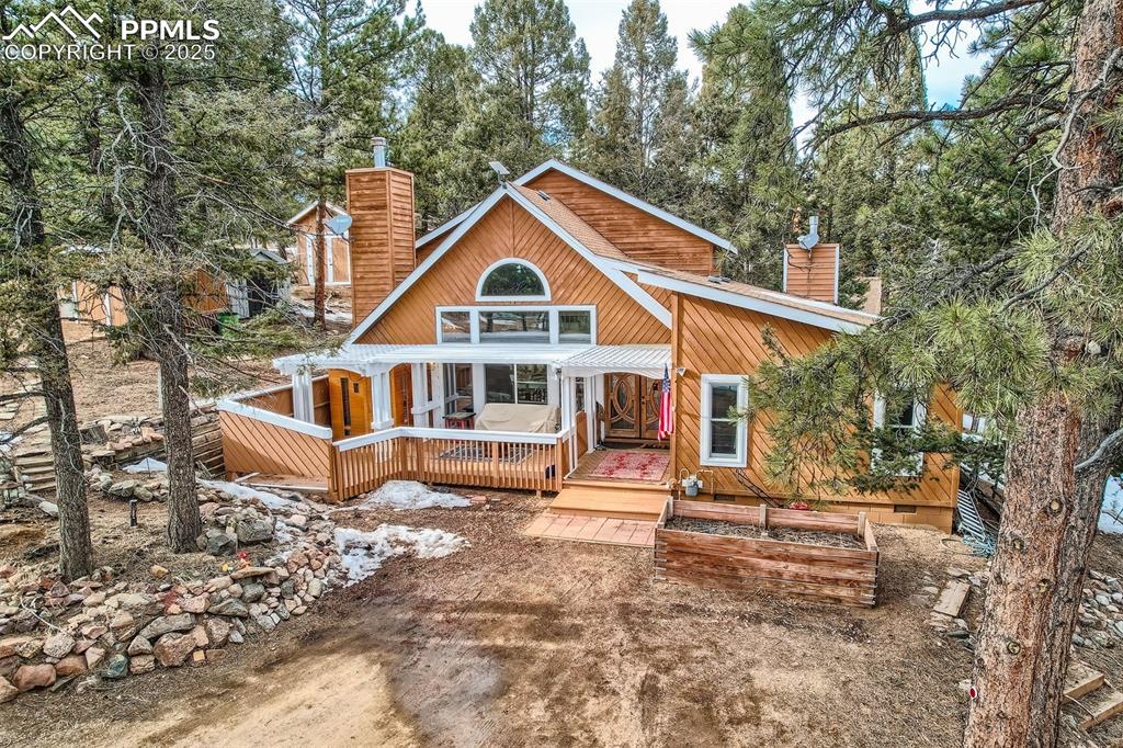 46 Barr Lake Circle Divide, CO 80814 - Photo 30 of 47 a view of a house with a yard