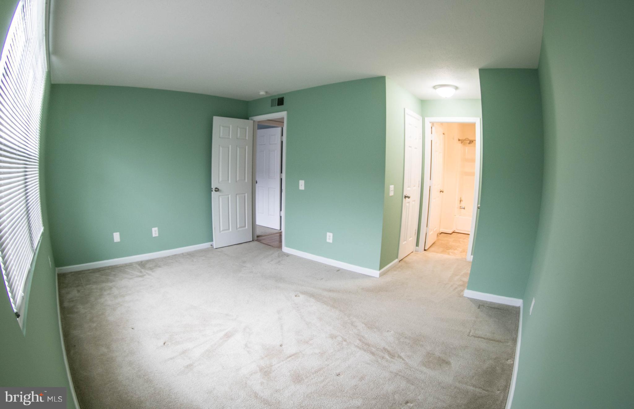 121 Fort Evans Road Southeast, Unit B Leesburg, VA 20175 - Photo 9 of 19 Spacious Master Bedroom