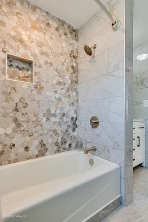 a bathroom with a bathtub