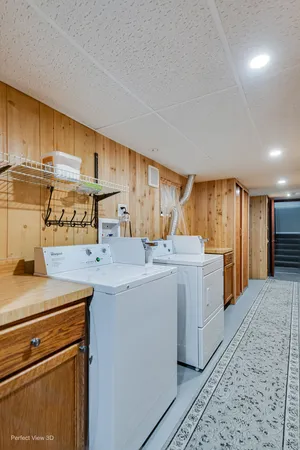 a kitchen that has a sink and a stove in it
