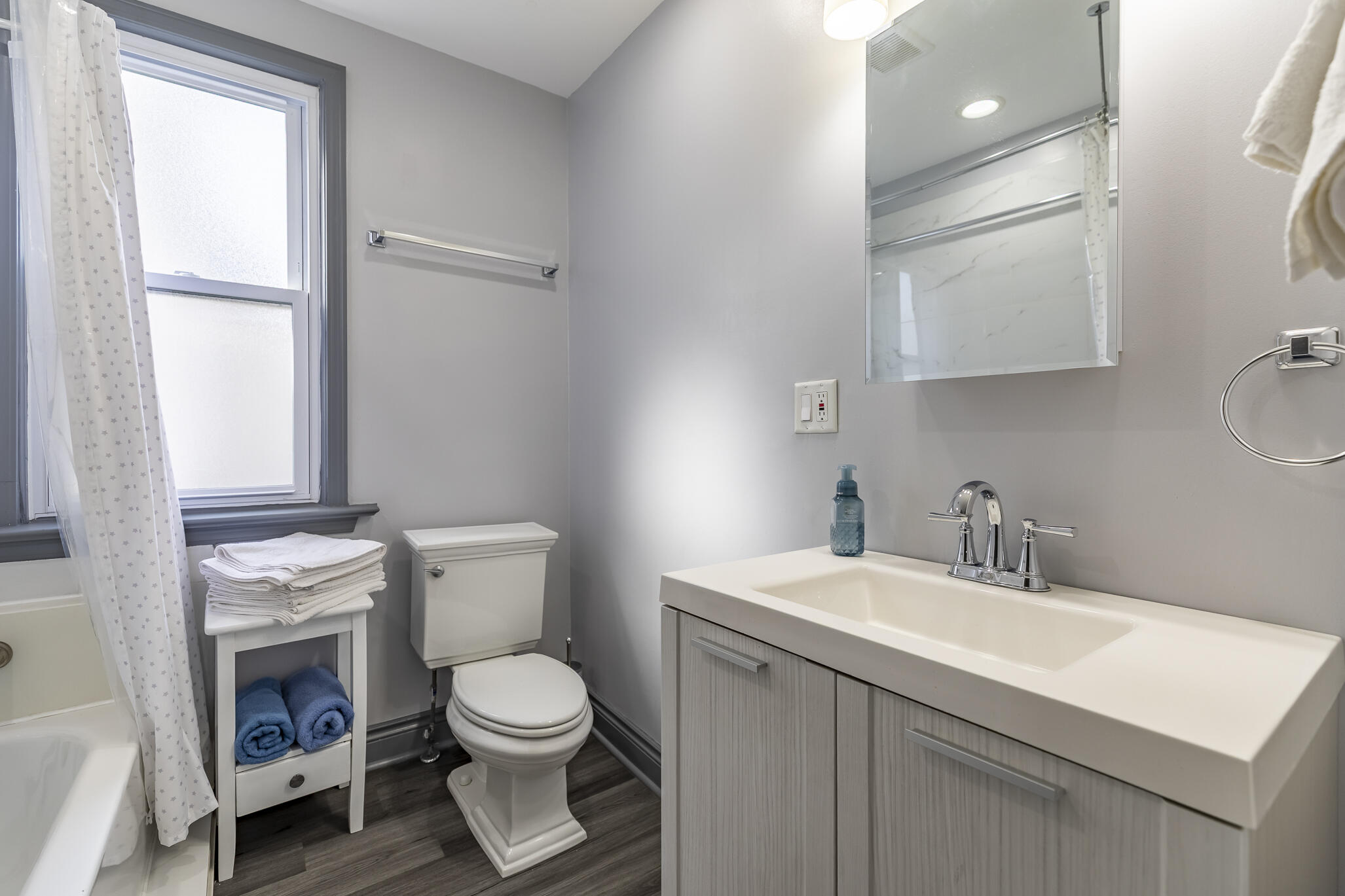 23 Mason Street Hammond, IN 46320 - Photo 14 of 62 a bathroom with a toilet a sink and a window