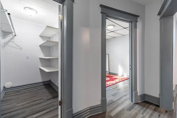 a view of a deck with wooden floor and wooden fence