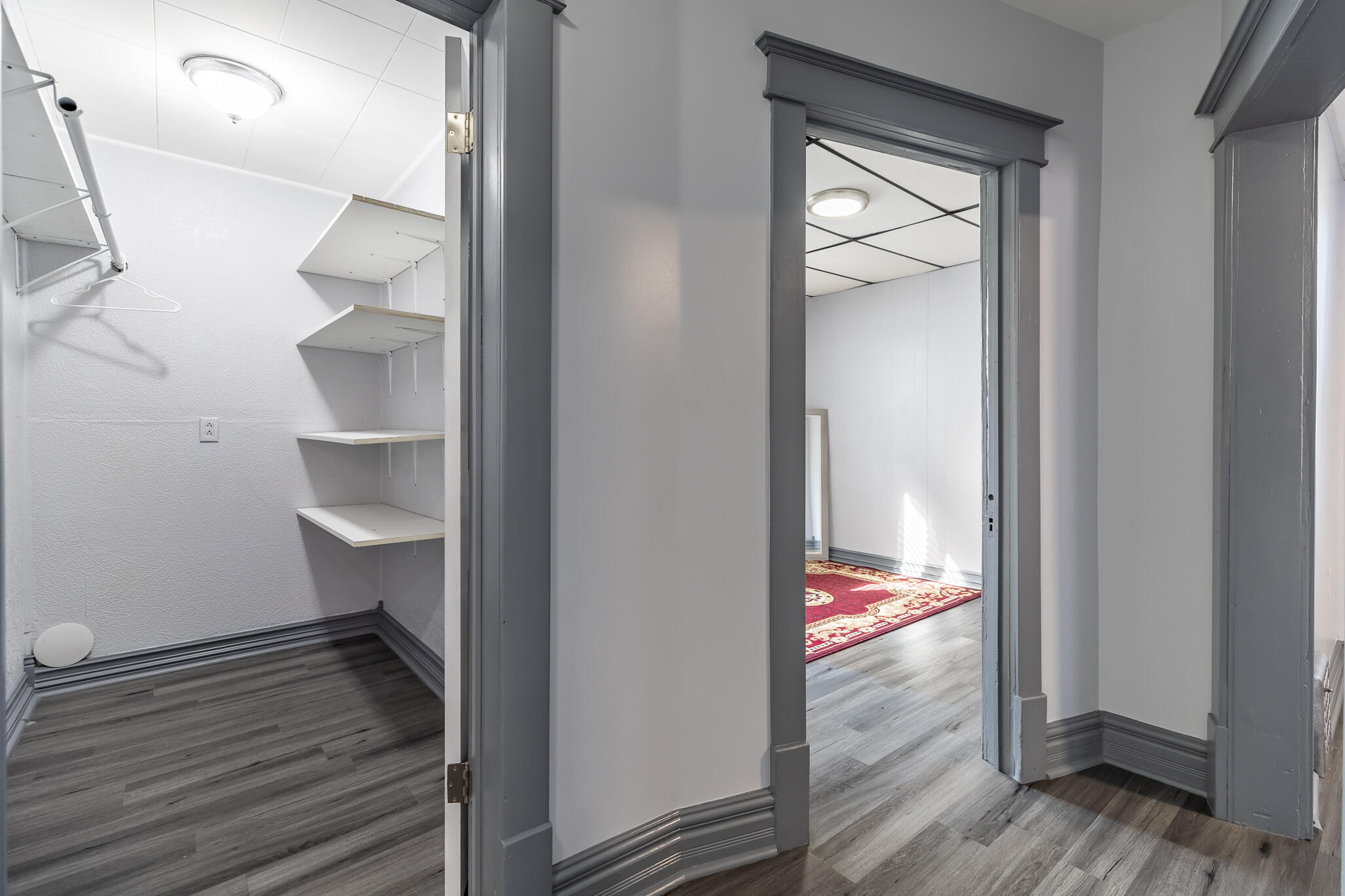 23 Mason Street Hammond, IN 46320 - Photo 18 of 62 a view of a room that has a bed with wooden floor