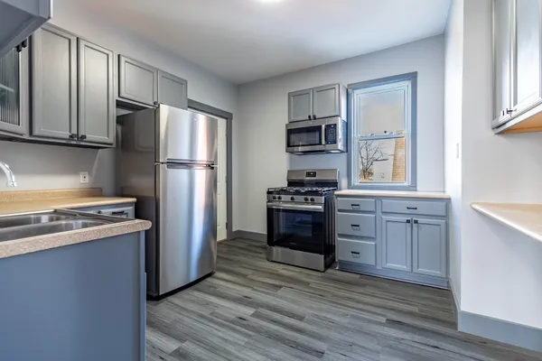 a bathroom with a toilet sink and bathtub