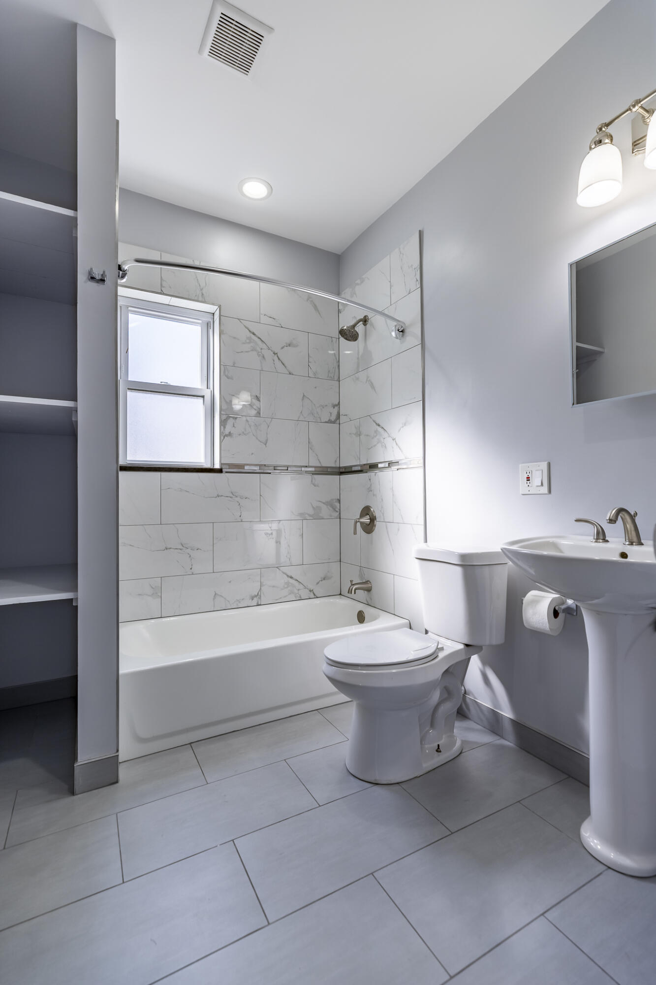 23 Mason Street Hammond, IN 46320 - Photo 37 of 62 a bathroom with a toilet sink and bathtub