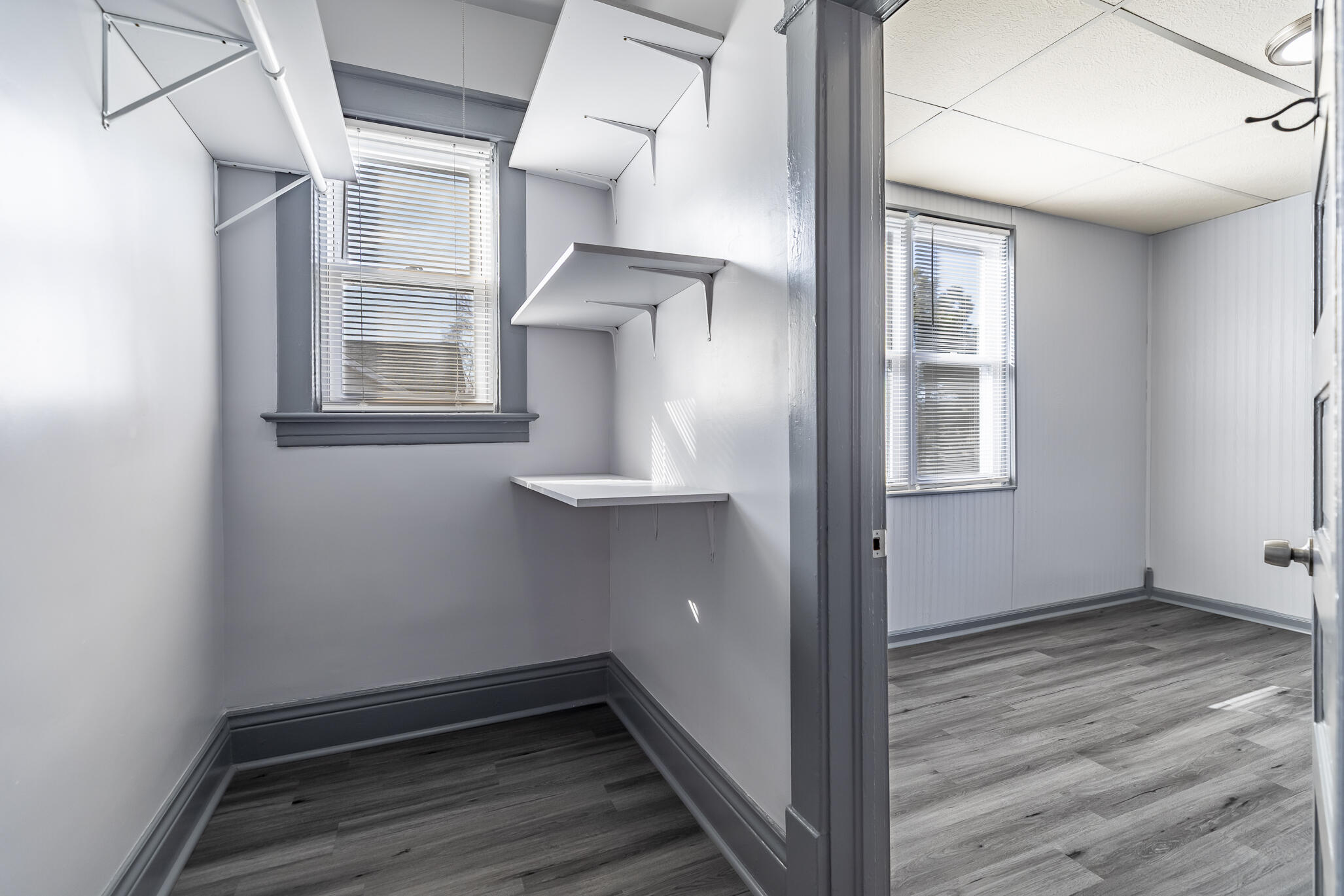 23 Mason Street Hammond, IN 46320 - Photo 39 of 62 a view of an empty room with wooden floor and a window