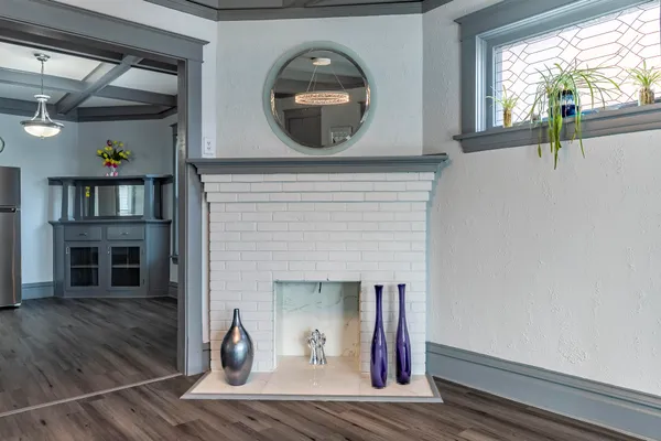 a kitchen with stainless steel appliances a stove a refrigerator and a microwave