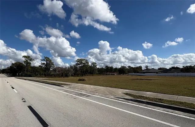 a view of a lake in middle of the house