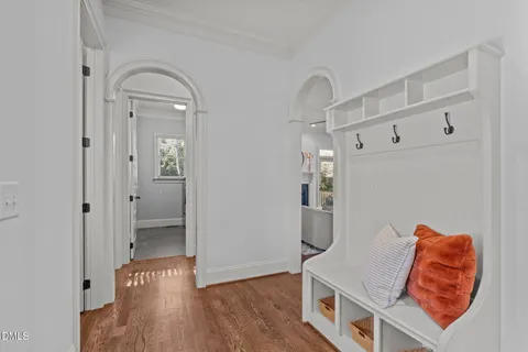 a view of a room with cabinet and a ceiling fan
