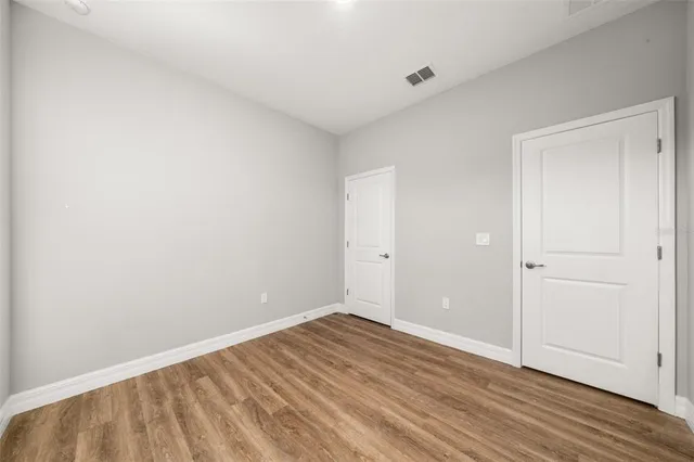 a bathroom with a shower and toilet