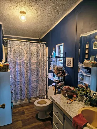 a view of a livingroom with furniture and toys