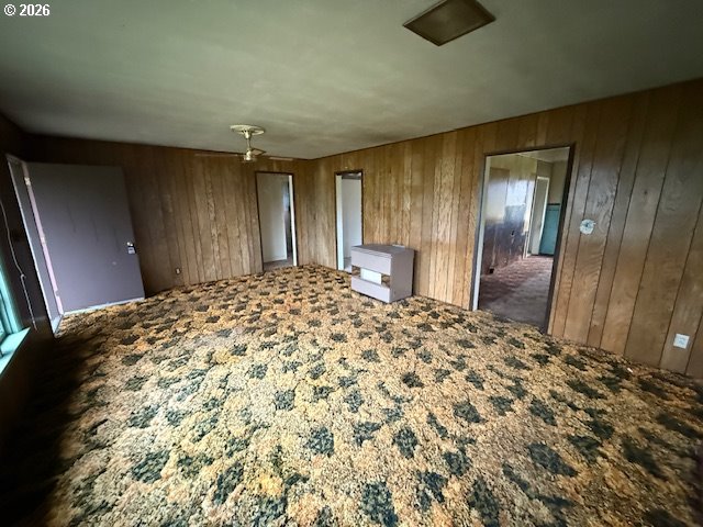 381 Gregory Drive Winston, OR 97496 - Photo 8 of 20 a large bedroom with a bed and wooden floor