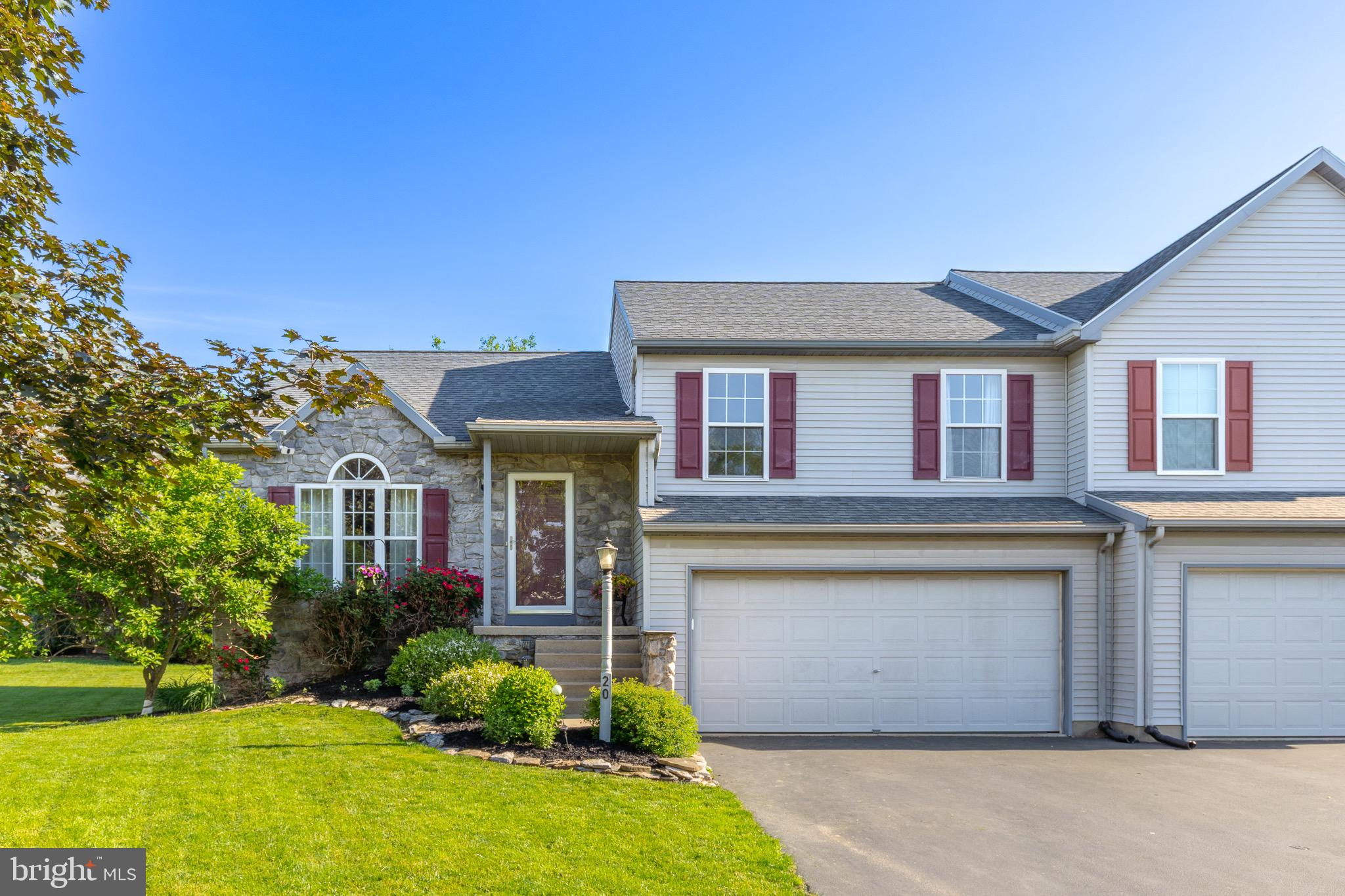 20 Pebble Creek Drive Lititz, PA 17543 - Photo 1 of 45 a front view of a house with garden