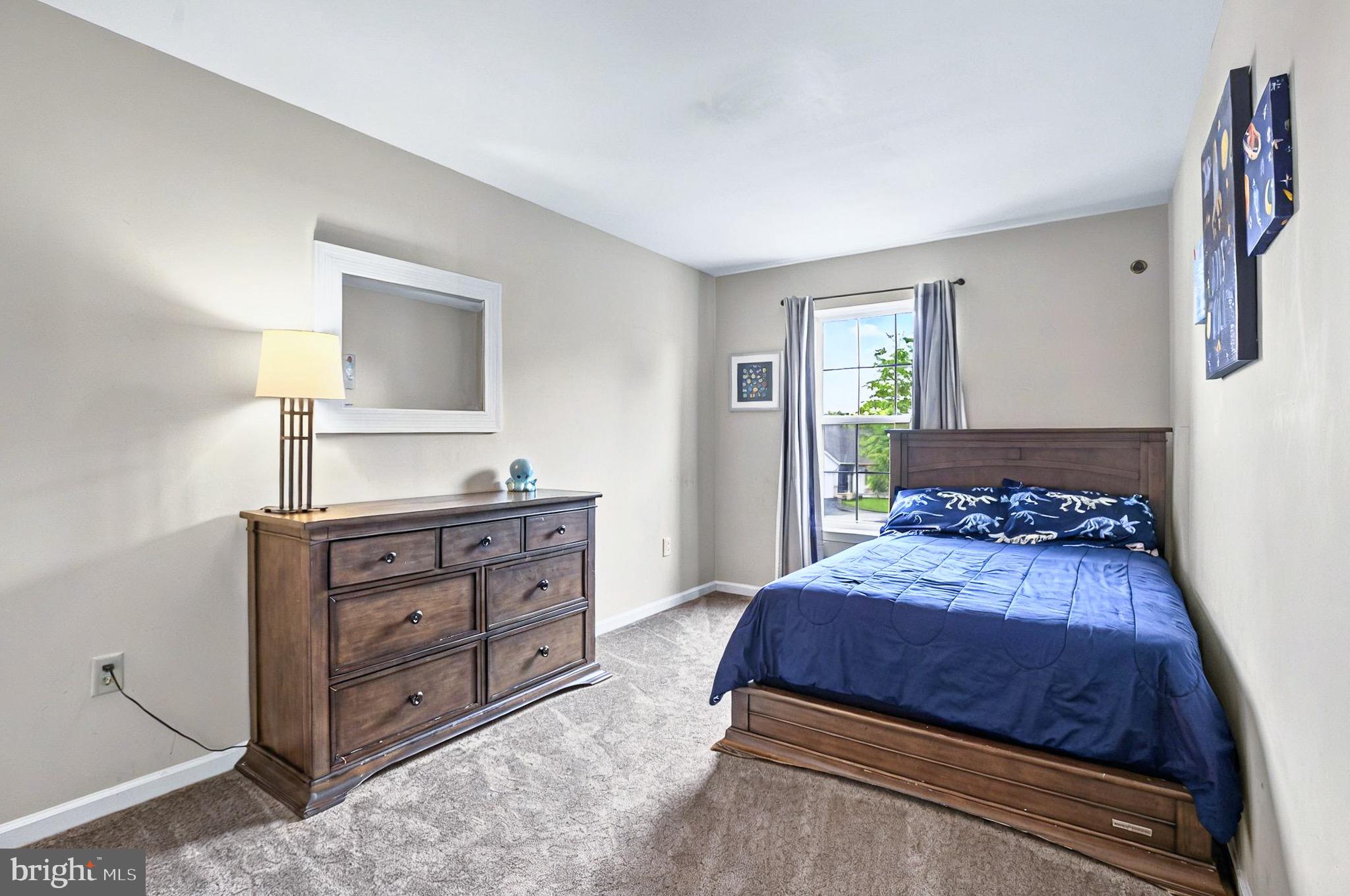 20 Pebble Creek Drive Lititz, PA 17543 - Photo 18 of 45 a bedroom with a bed and a dresser