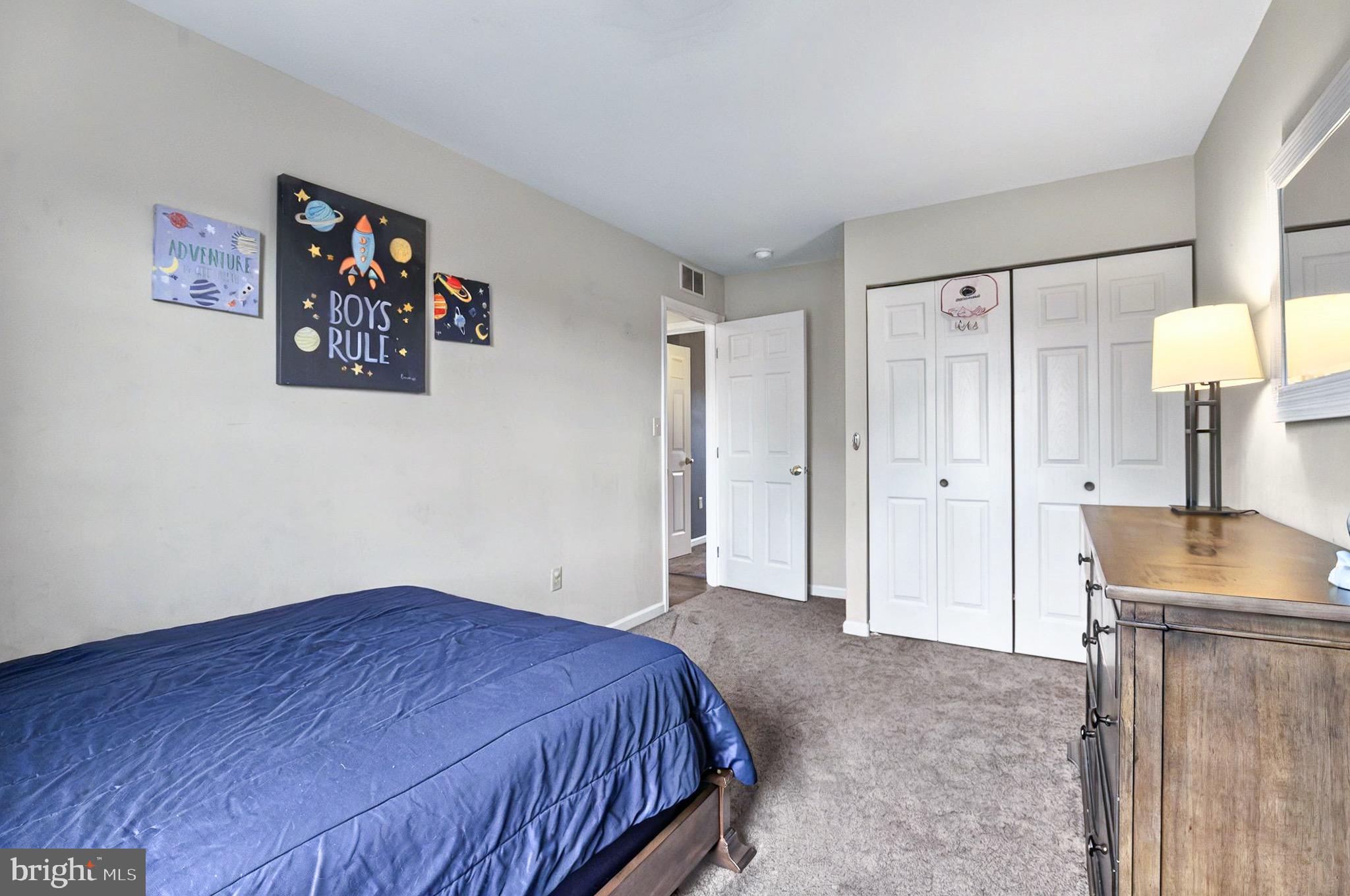 20 Pebble Creek Drive Lititz, PA 17543 - Photo 19 of 45 a bedroom with a bed and a table