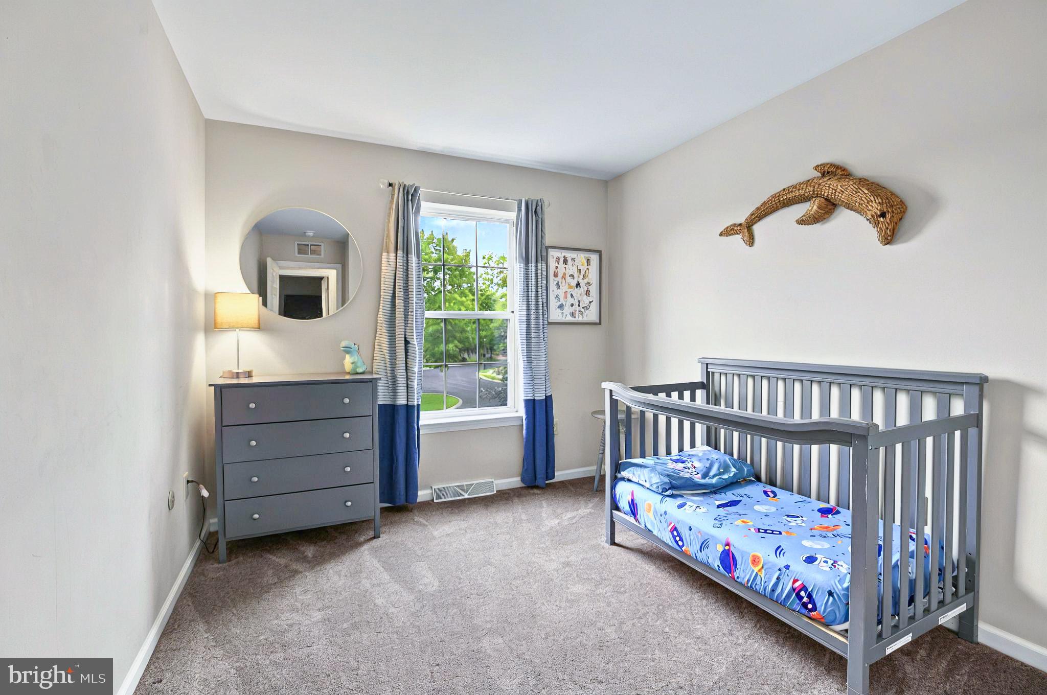 20 Pebble Creek Drive Lititz, PA 17543 - Photo 20 of 45 a bedroom with a bed and a window