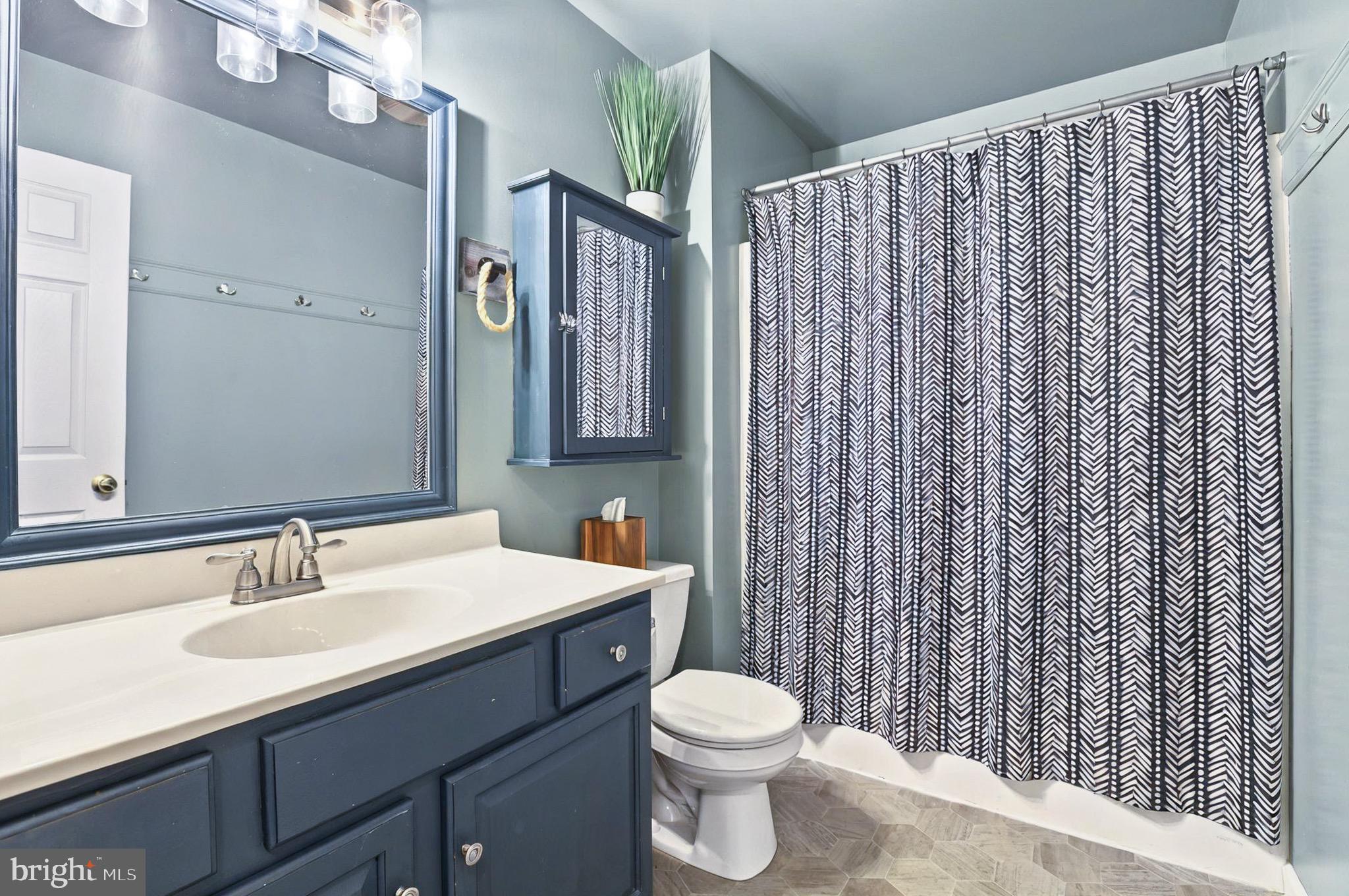 20 Pebble Creek Drive Lititz, PA 17543 - Photo 22 of 45 a bathroom with a sink vanity mirror and toilet