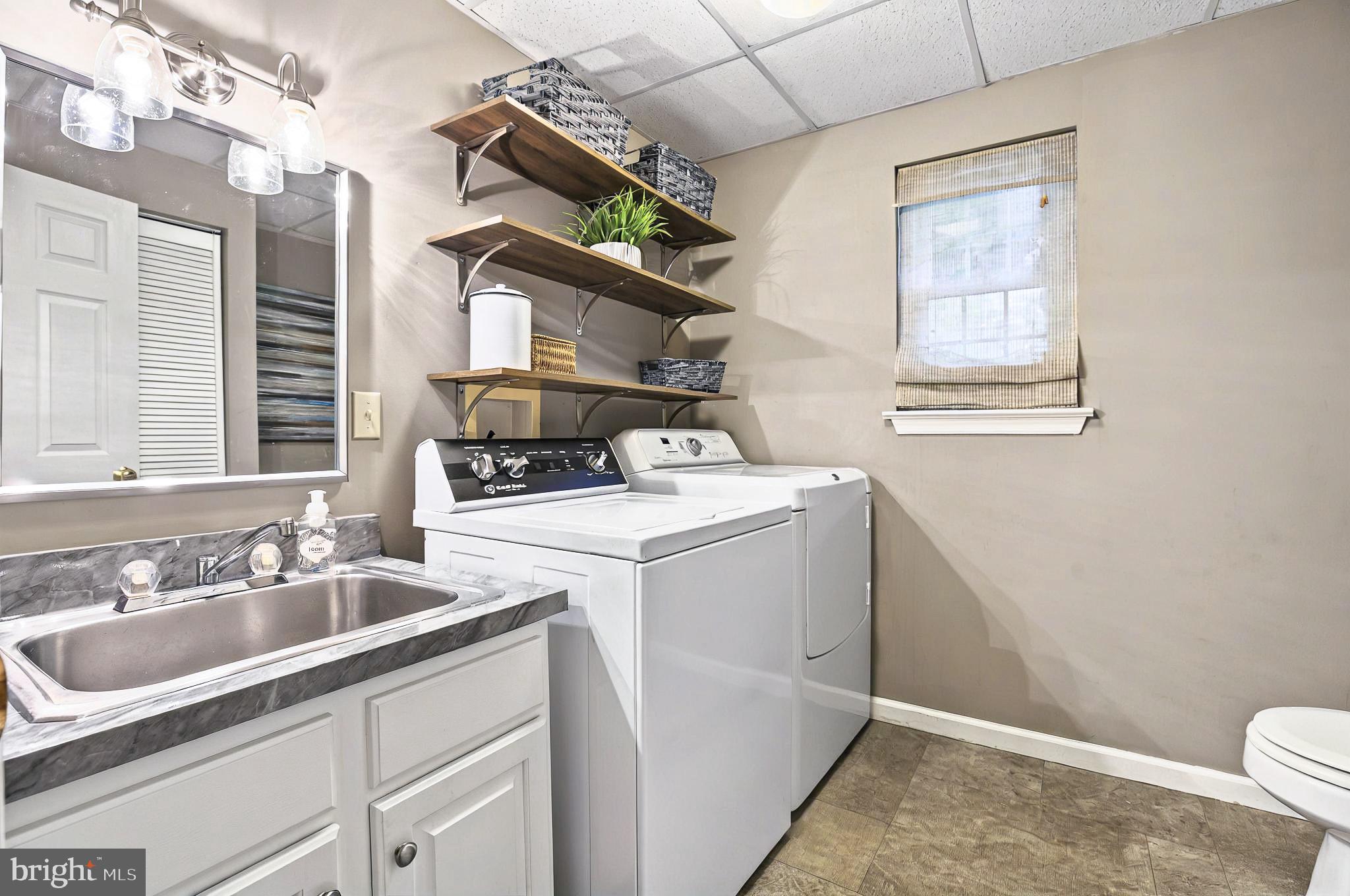 20 Pebble Creek Drive Lititz, PA 17543 - Photo 26 of 45 a utility room with sink dryer and washer