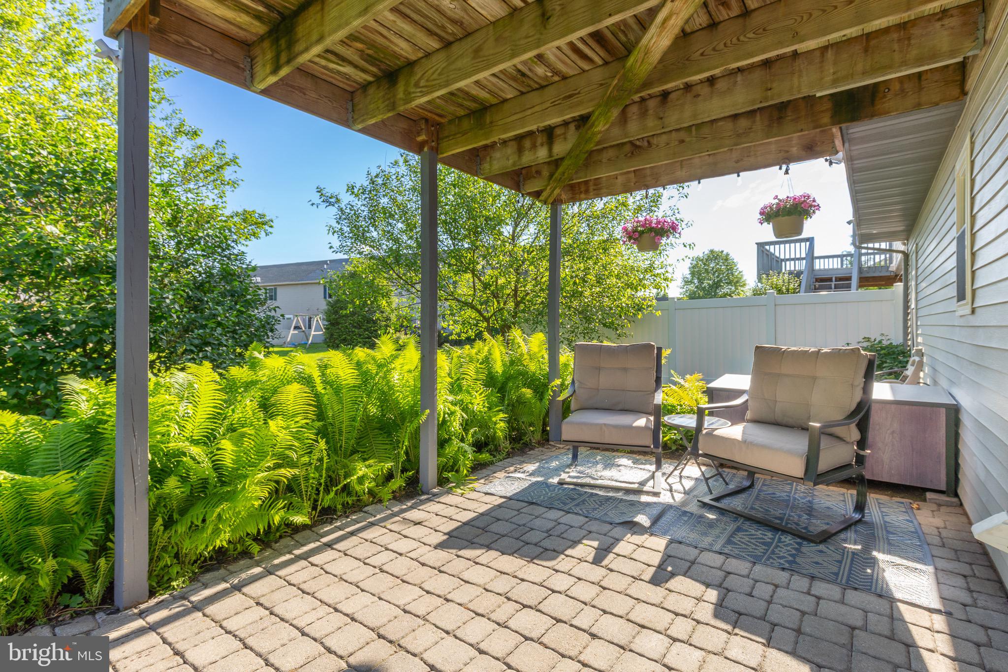 20 Pebble Creek Drive Lititz, PA 17543 - Photo 29 of 45 a view of a patio with table and chairs potted plants