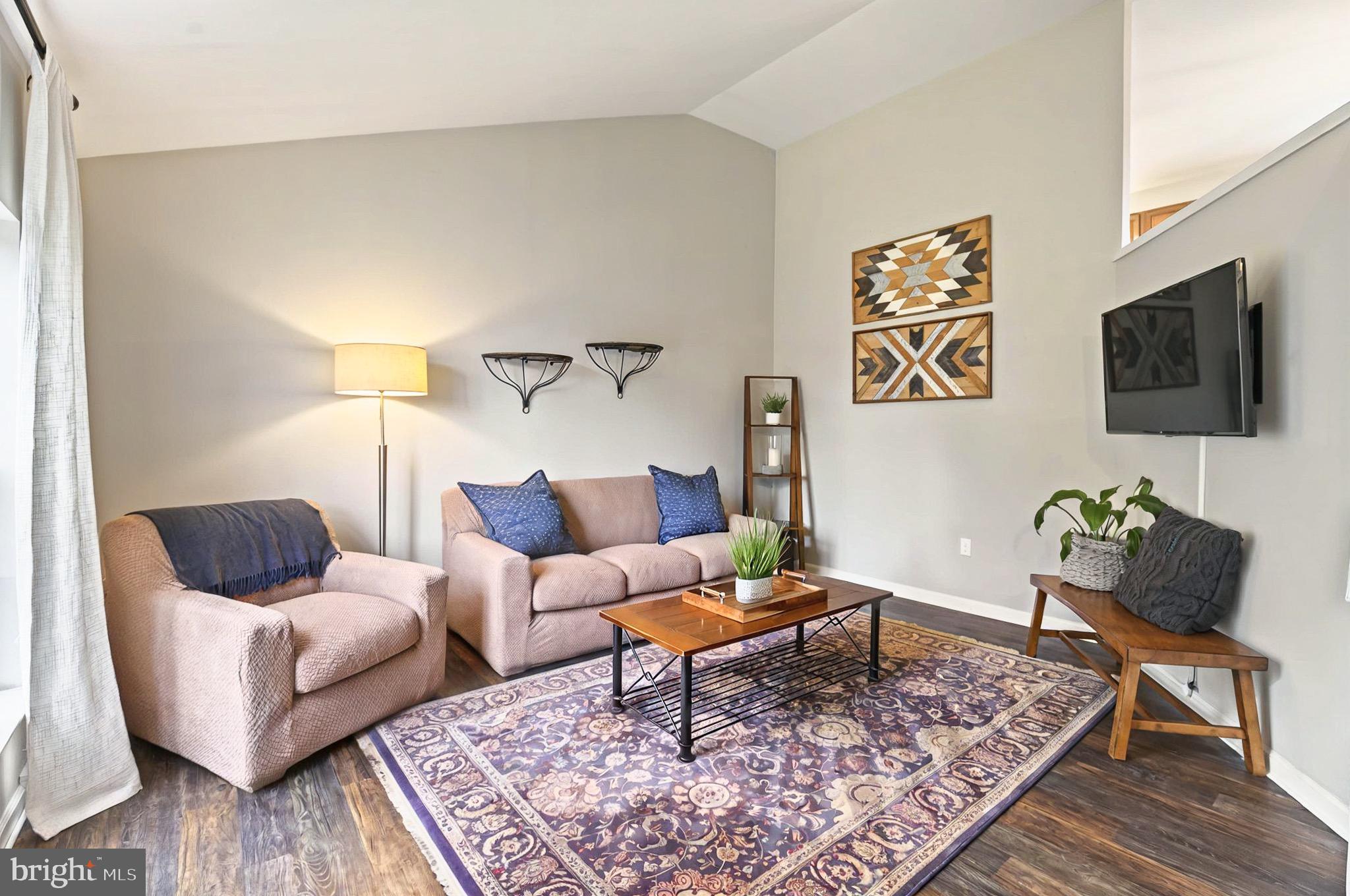 20 Pebble Creek Drive Lititz, PA 17543 - Photo 6 of 45 a living room with furniture and a flat screen tv