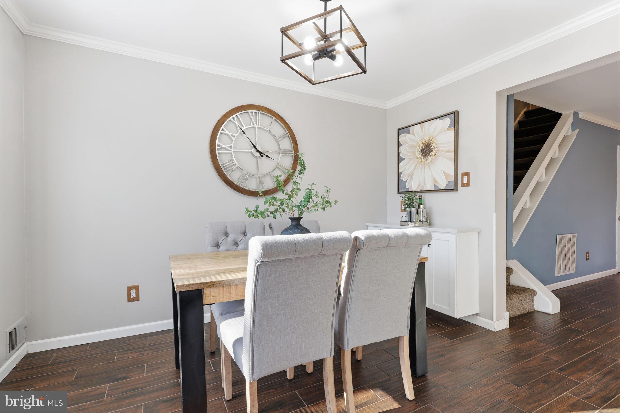 2 Heather Court Newtown, PA 18940 - Photo 13 of 34 a view of a dining room with furniture wooden floor and a clock