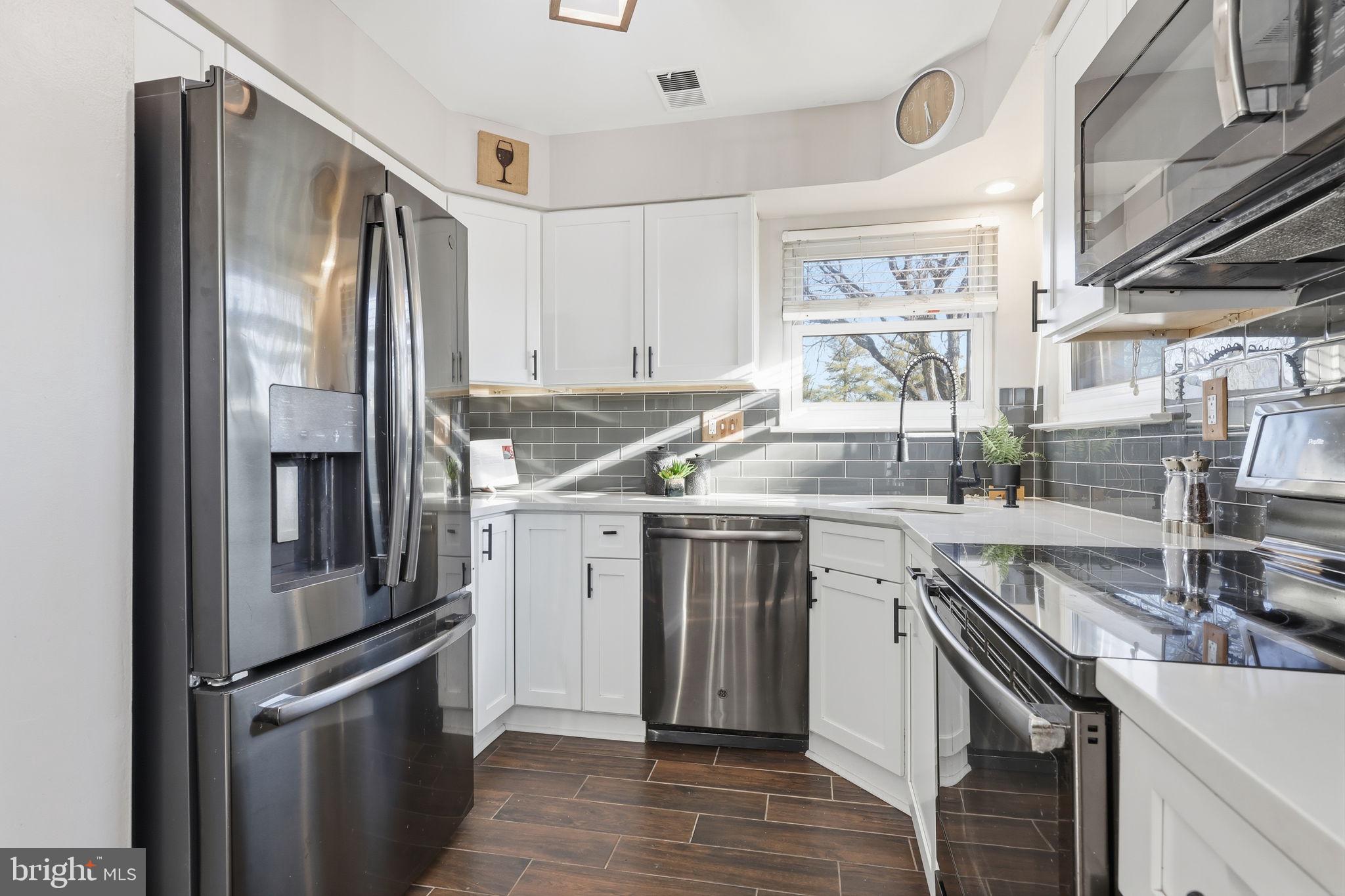 2 Heather Court Newtown, PA 18940 - Photo 15 of 34 a kitchen that has a sink stainless steel appliances and cabinets