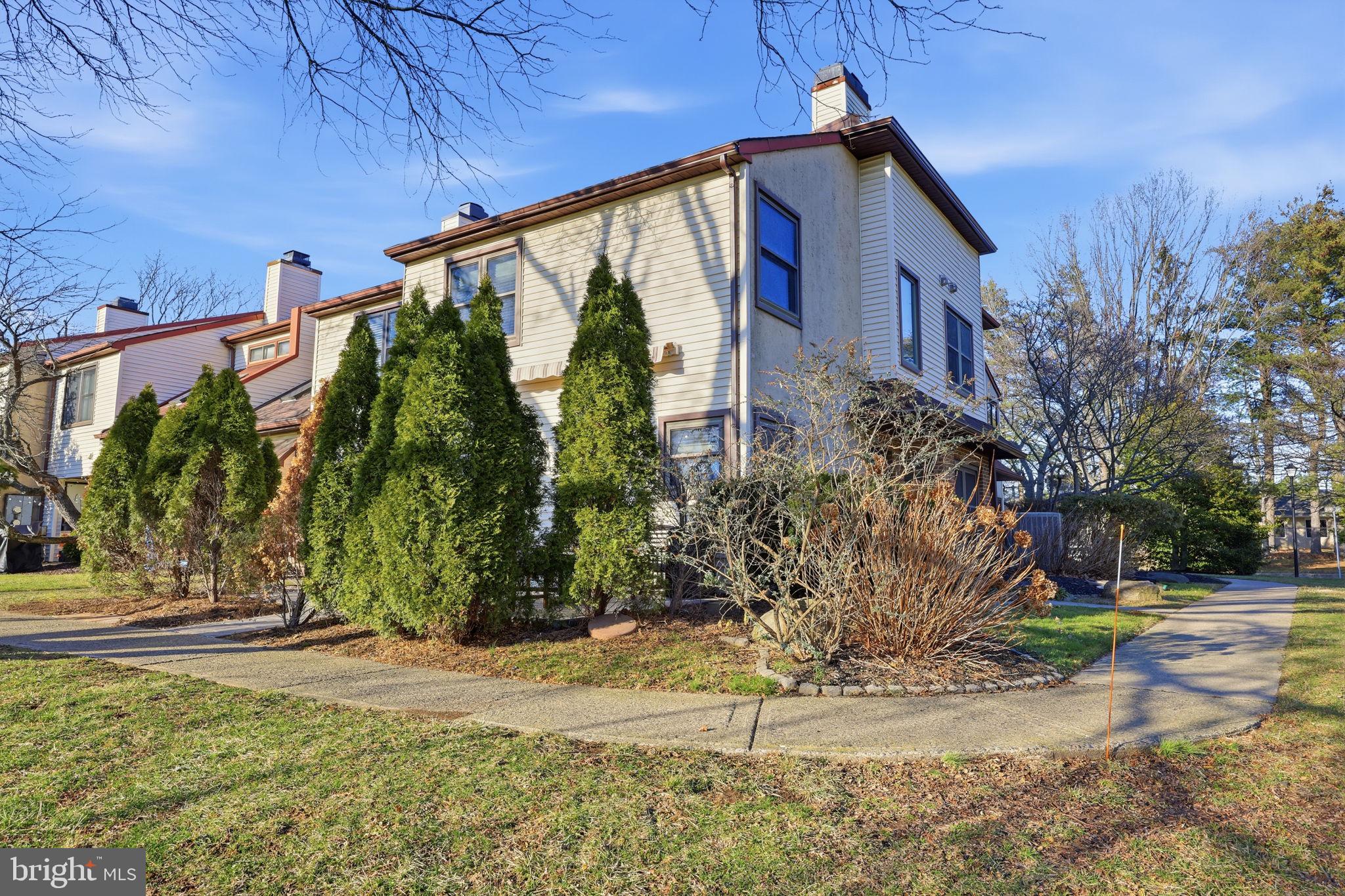 2 Heather Court Newtown, PA 18940 - Photo 3 of 34 a front view of a house with garden