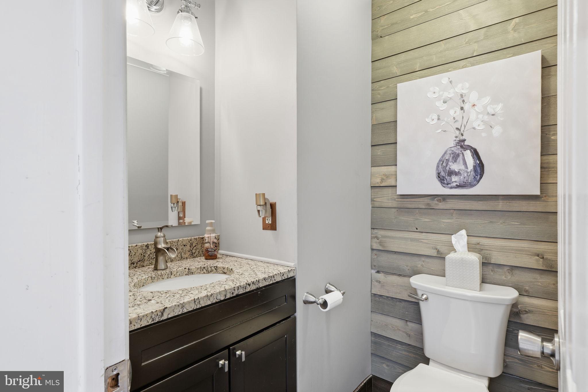 2 Heather Court Newtown, PA 18940 - Photo 7 of 34 a bathroom with a granite countertop sink toilet and a mirror