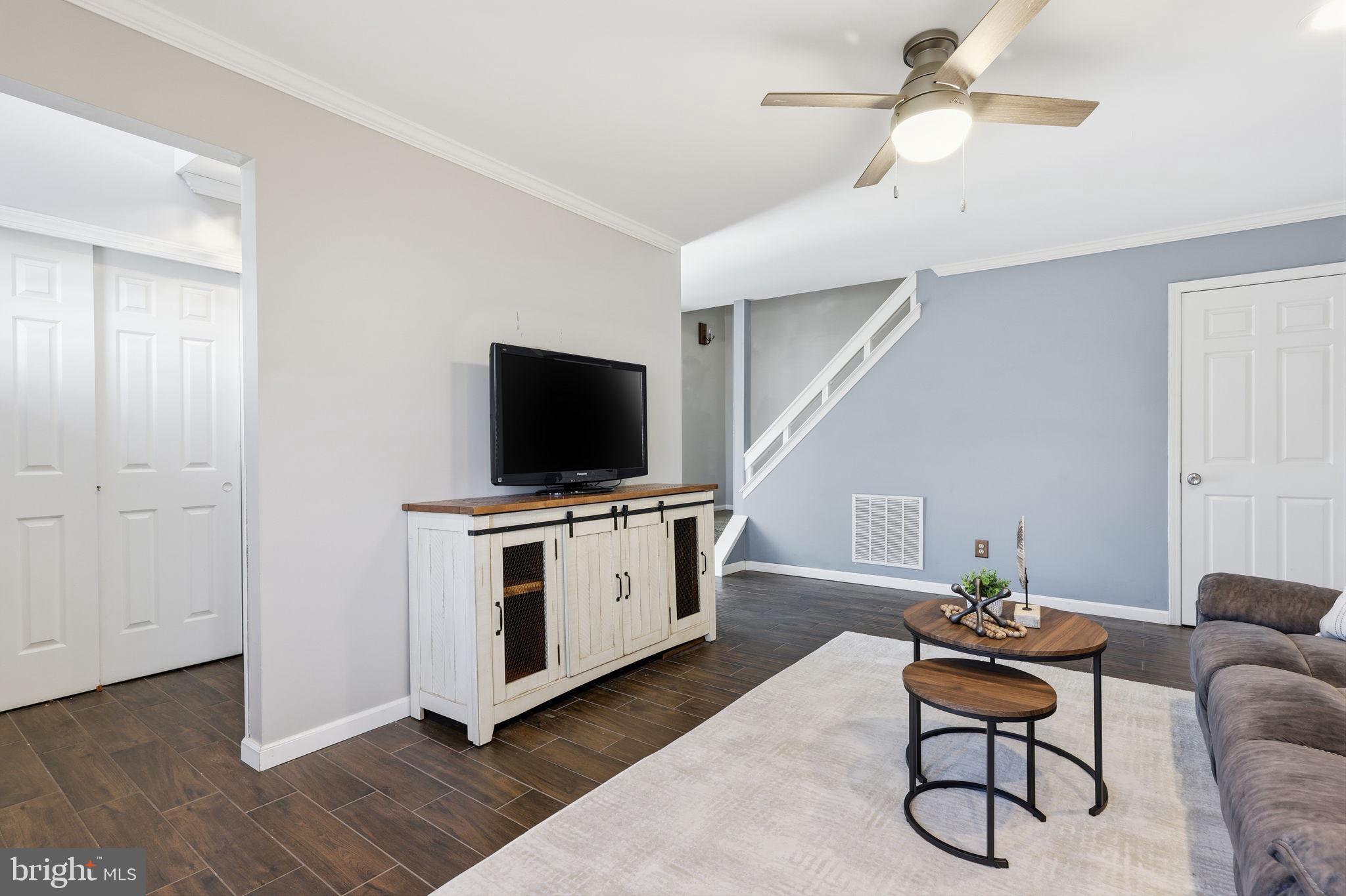 2 Heather Court Newtown, PA 18940 - Photo 9 of 34 a living room with furniture and a flat screen tv