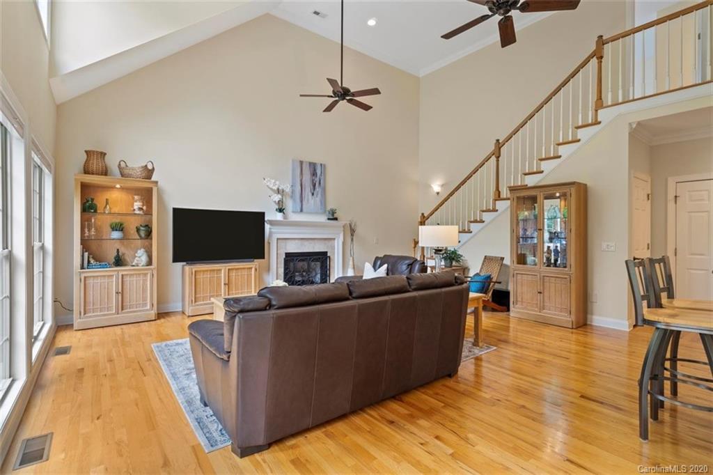 142 Spring Branch Road Fort Mill, SC 29715 - Photo 17 of 48 a living room with furniture and a flat screen tv