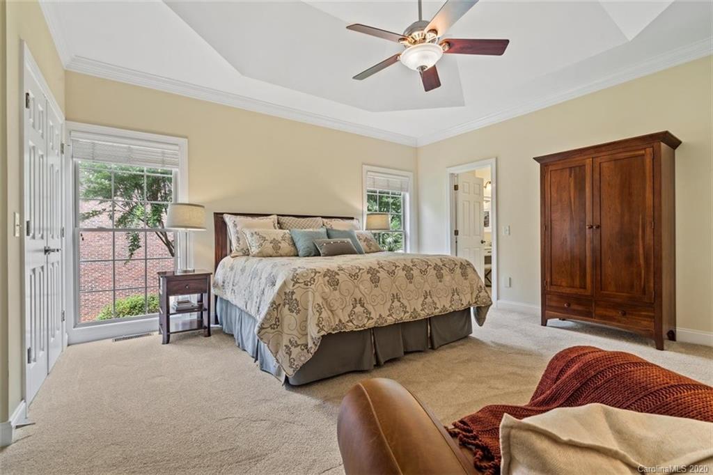 142 Spring Branch Road Fort Mill, SC 29715 - Photo 18 of 48 a bedroom with a bed and large window