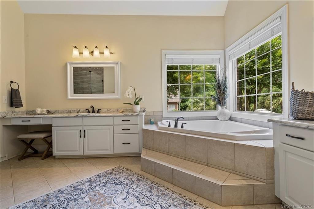142 Spring Branch Road Fort Mill, SC 29715 - Photo 21 of 48 a bath room with a sink and large window