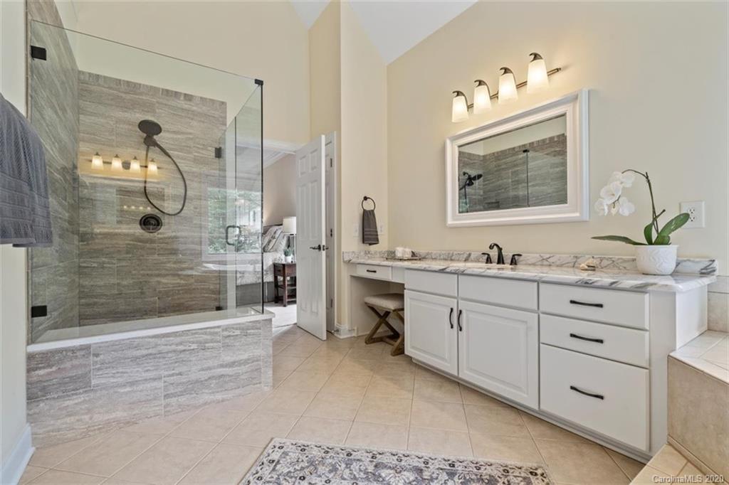142 Spring Branch Road Fort Mill, SC 29715 - Photo 22 of 48 a bathroom with double vanity sink and a mirror